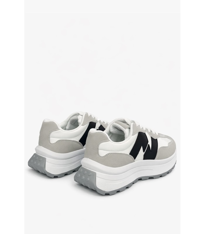 Λευκό sneaker με chunky σόλα και μαύρο σχέδιο στο πλάι