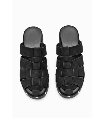 Μάυρα flatform mules με πλεγμένες φάσες και τρουκς