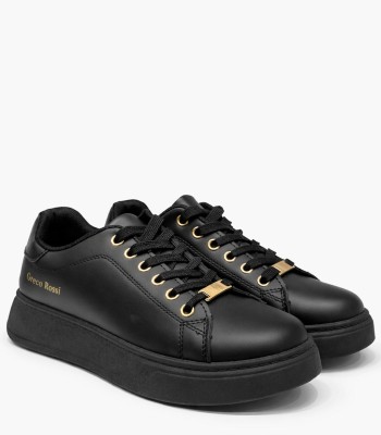 Μαύρο sneaker με μαύρη σόλα και χρυσές λεπτομέρειες